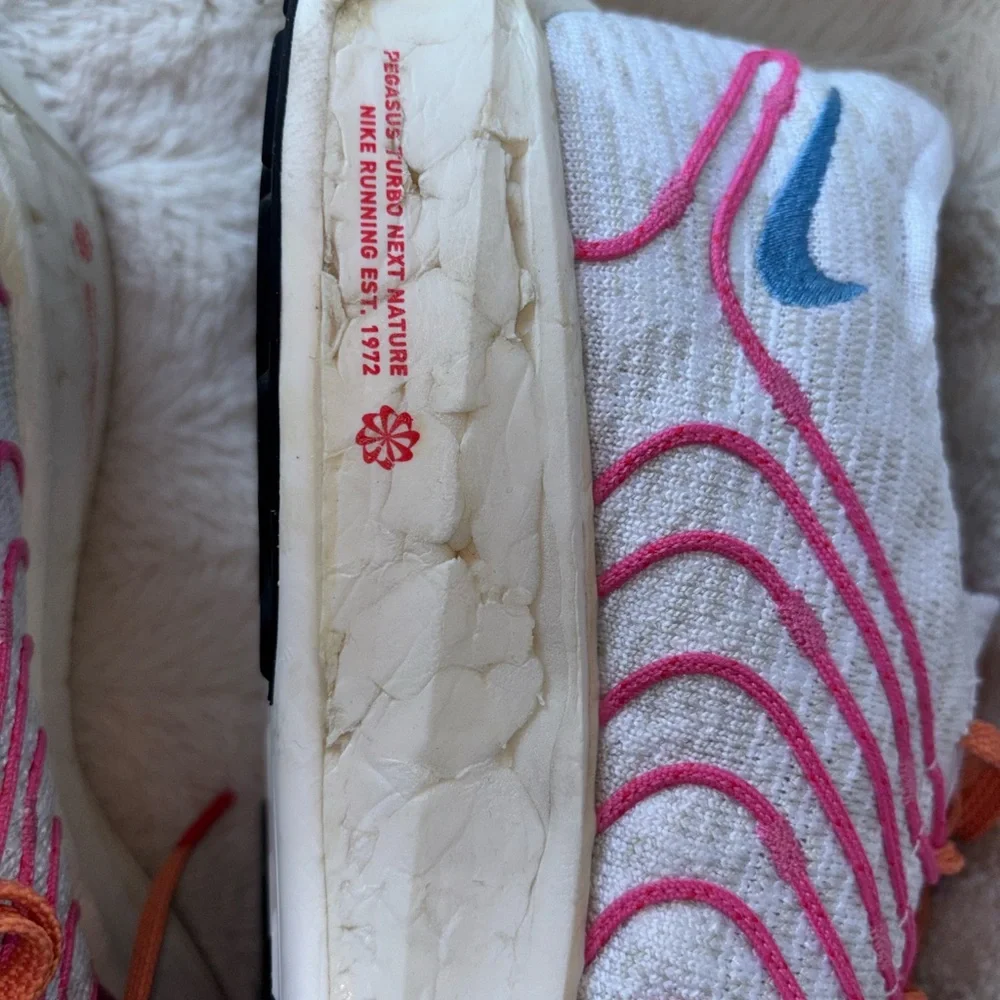 Nike Women's White Running Shoes with Pink, Blue & Orange Accents size 10.5